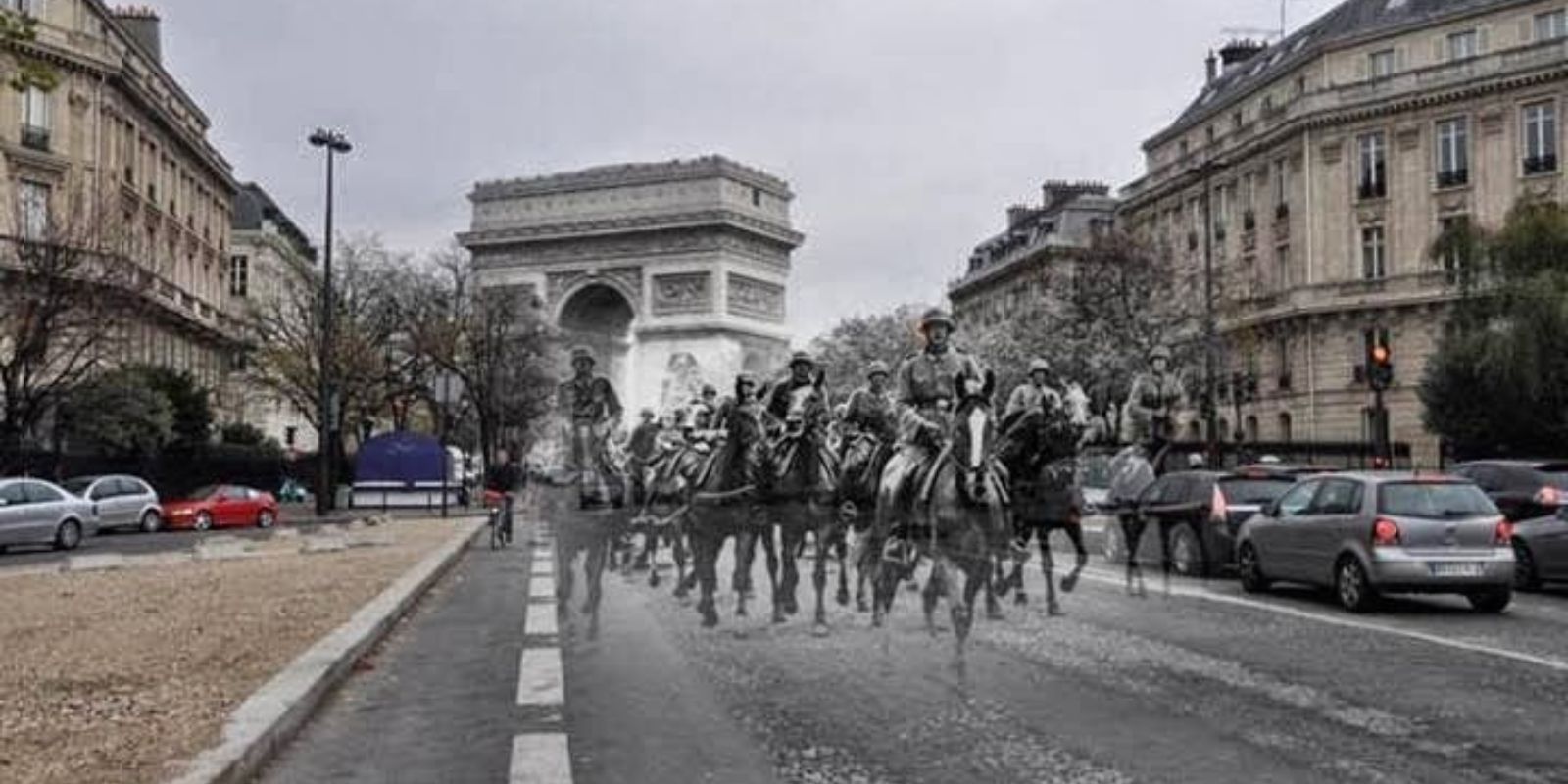 Uma unidade de cavalaria alemã marcha por uma avenida parisiense em 1940, com o Arco do Triunfo ao fundo, em uma montagem que a sobrepõe ao tráfego e à vida da cidade em 2010. A montagem coloca esses soldados fantasmagóricos em meio ao tráfego moderno, um lembrete de que a história está sempre presente, mesmo que invisível. Autor: Sergey Larenkov.